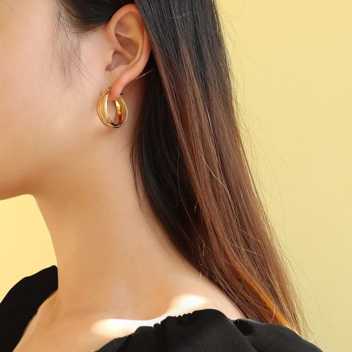 Crossed twist chunky hoop earings in gold plating stainless steel