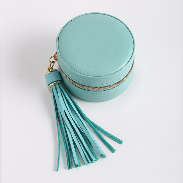 Tassels Decor Round PU Leather Small Portable Jewelry Storage Box / Boîte de stockage de bijoux